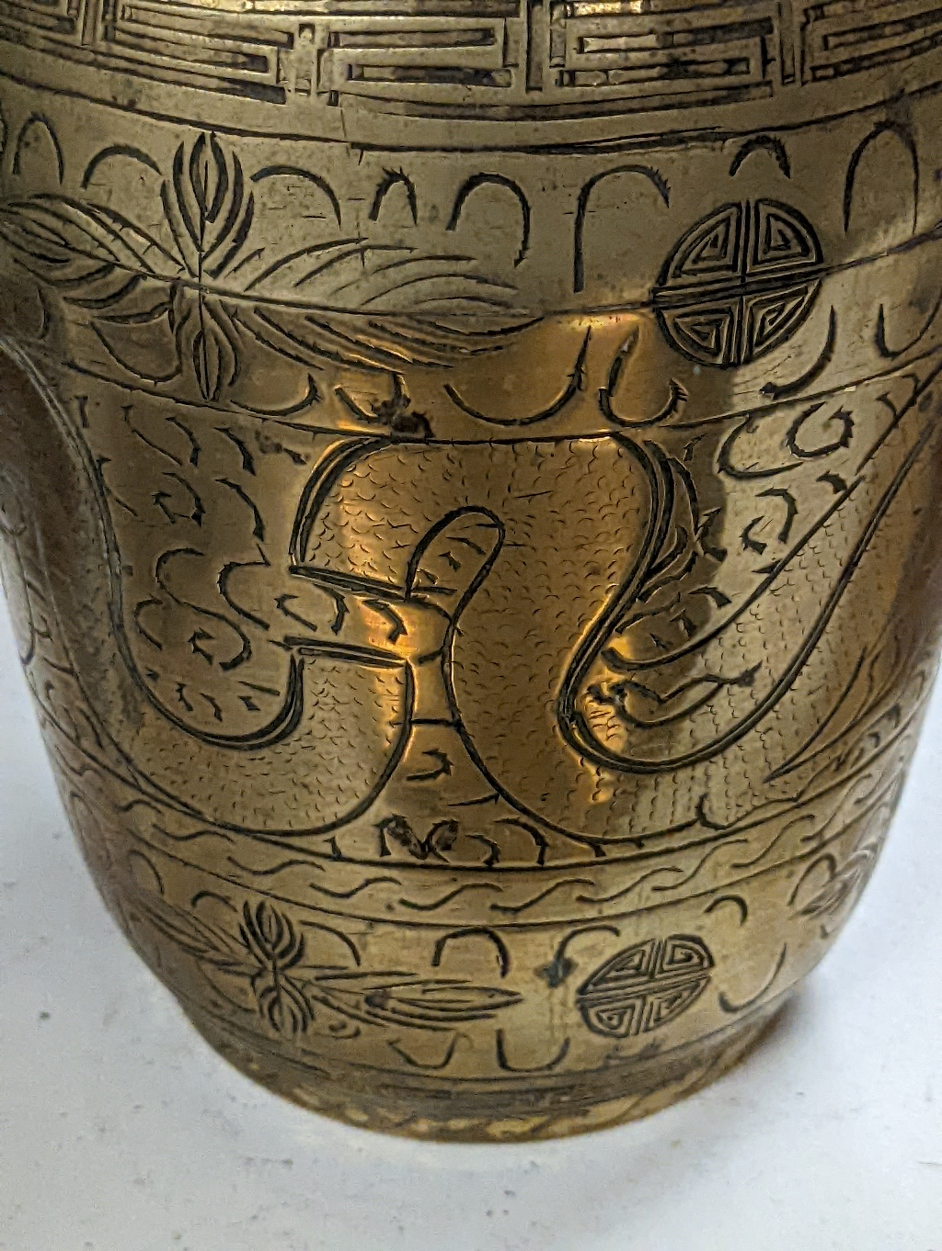 Two early 20th century Chinese bronze vases and a similar tray, 35cm diam.